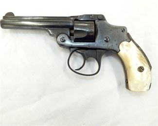 VIEW 2 CLOSEUP W/ PEARL GRIPS 32CAL. 