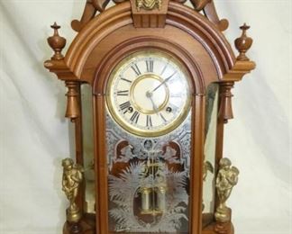 WALNUT CASE CLOCK W/ MERCURY PEDALUM 