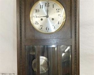 WALL CLOCK W/ CARVING 