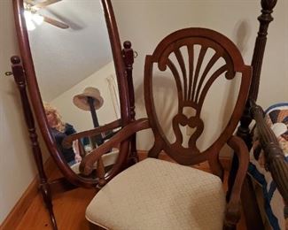 Tiltable full size dressing mirror. Vintage wood accent chair.