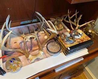 Misc antlers and sportsman prints.