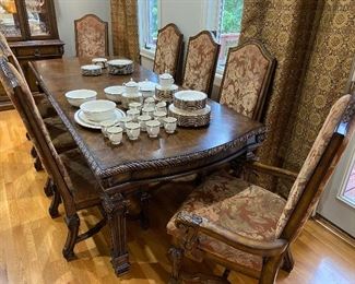 SUPER NICE wooden dining table, 2 leaves and 8 chairs.