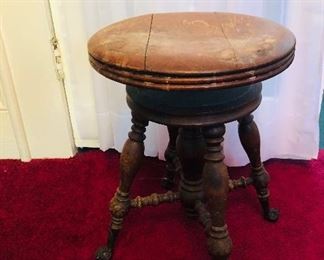 Piano stool with glass ball and claw feet