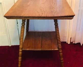2 tier oak parlor table with turned legs