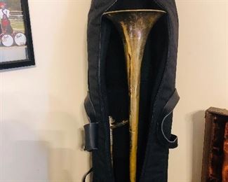 Vintage trombone in gig bag