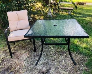 NIB patio set. There are 4 chairs