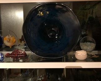 Blown Glass Disc shows the blue hues at night.