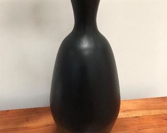 close up of tall black vase Crate & Barrel