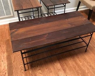 3 Piece coffee table/side table wood & metal. Coffee table is about 24" wide x 4' long x 19" tall. Side tables are about 18" wide x 24" long x 2' tall. $75