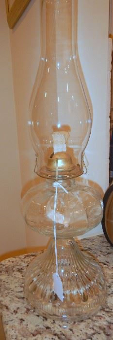 Glass hurricane oil lamp