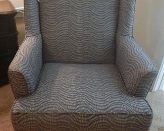 Great chair, blue wavy upholstered fabric.  Great condition