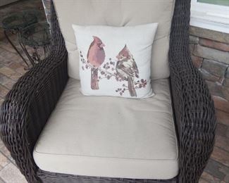 another outdoor wicker club chair with cushions