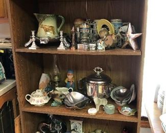Cookie jars, tea pots, decorative items.  Silver.  Oil lamp.