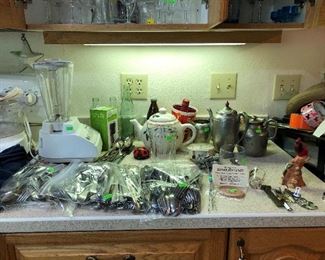 Flatware/silverware, tea pots.  Blender.