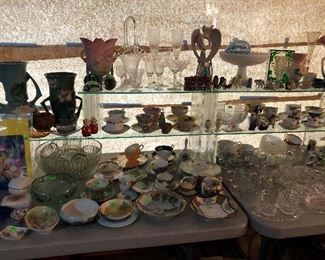 More glassware.  Tea cups, Roseville, Angel figure, Champagne glasses.