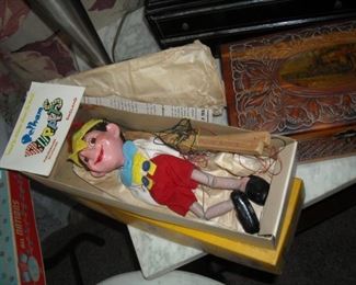 Handmade and painted Pinochio puppet found new in the box.  From England  by Pelham