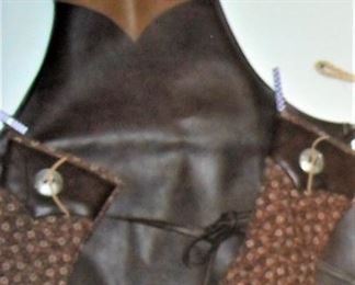 The outdoor cook will look good in leather apron and matching leather embellished gloves!