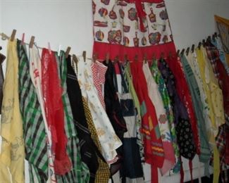 Large assortment of aprons - Both bib and waist tie, handmade and embroidered aprons.