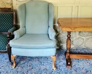 Table folds out and leaf comes out of the center 