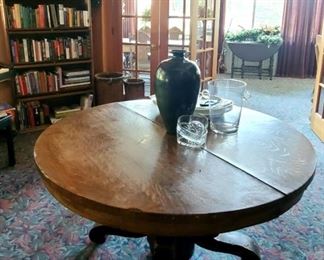 Large Round Table, needs some tlc. Books are for sale, Bookcase is not available