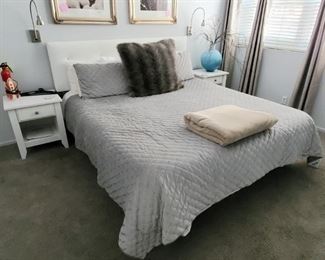 King size bed and plush bed set. 2 Nightstands