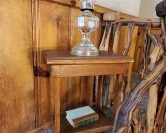 Many oil lamps and small tables