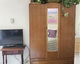 Antique Armoire, antique table and 32" tv