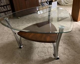 Glass top coffee table with two matching in tables
