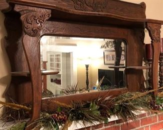ANTIQUE MIRRORED CARVED TOP/MANTLE