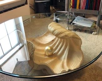 Designer coffee table. orig price $5,000.  3/4 " beveled glass top.  Shell base with giant pearl.
