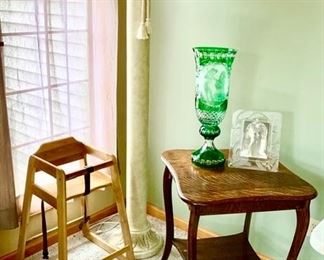 Wooden parlor table, wooden high chair, Czech green to clear cut glass vase, crystal picture frame