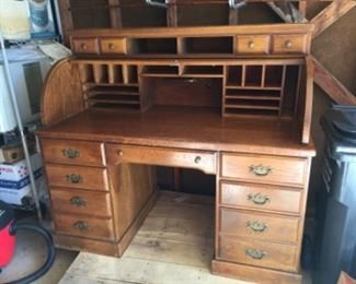 Solid oak roll top desk. Previously owned by prominent Minnesota Doctor.
