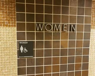 Men and women's bathroom signs