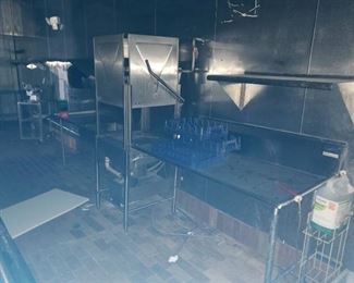 Dishwasher with clean and dirty side tables