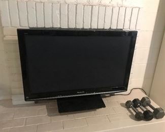 Flat screen TV and weights