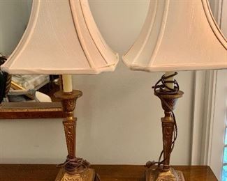 $150 - Pair of lamps. 25.5"H, bases are 5" square, shades are 11.5" square. One shade has a tear in the side.