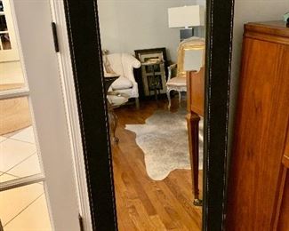 $120 - Contemporary mirror in black suede frame with stitching, 55"H x 23.5"W 