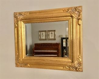 $125 - Beveled, gilt wall mirror, 18"H x 21"W