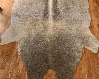 $80 - Faux rug, approximately 7' x 5'
