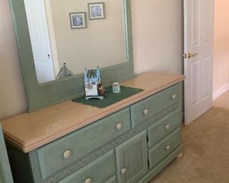 Lovely farmhouse/coastal queen bedroom set with headboard and bedframe, one nightstand, long mirrored dresser and small armoire. Sage green and sand!