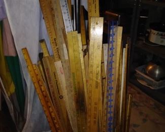 More than a hundred vintage yardsticks