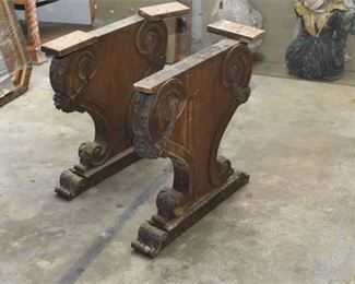 42. Pair Carved Trestle Table Ends