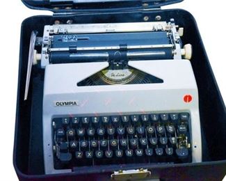 100. OLYMPIA Portable Typewriter