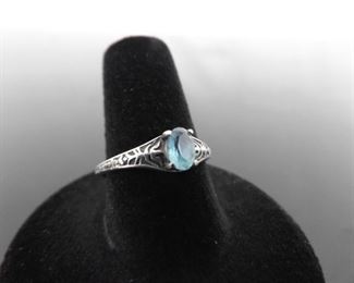 .925 Sterling Silver Oval Cut Topaz Scrolled Ring Size 8

