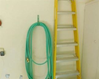 8-foot ladder with a hose