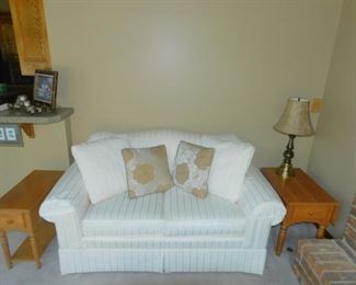 Very sharp looking white love seat