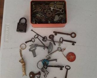 Motorcycle Tin with Old Keys and Lock