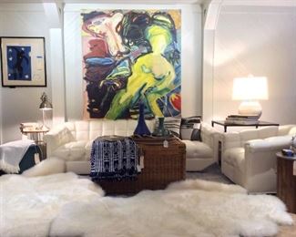Mid century faux leather sofa and chair, monumental oil on canvas, wicker chest.