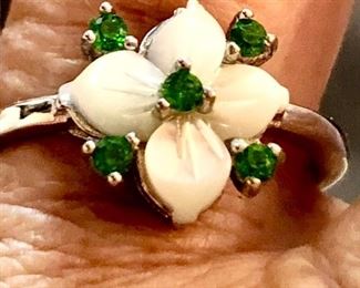 Hand carved mother of pearl ring  with emeralds 
