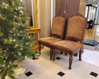 These two chairs are part of a formal dining set we have!